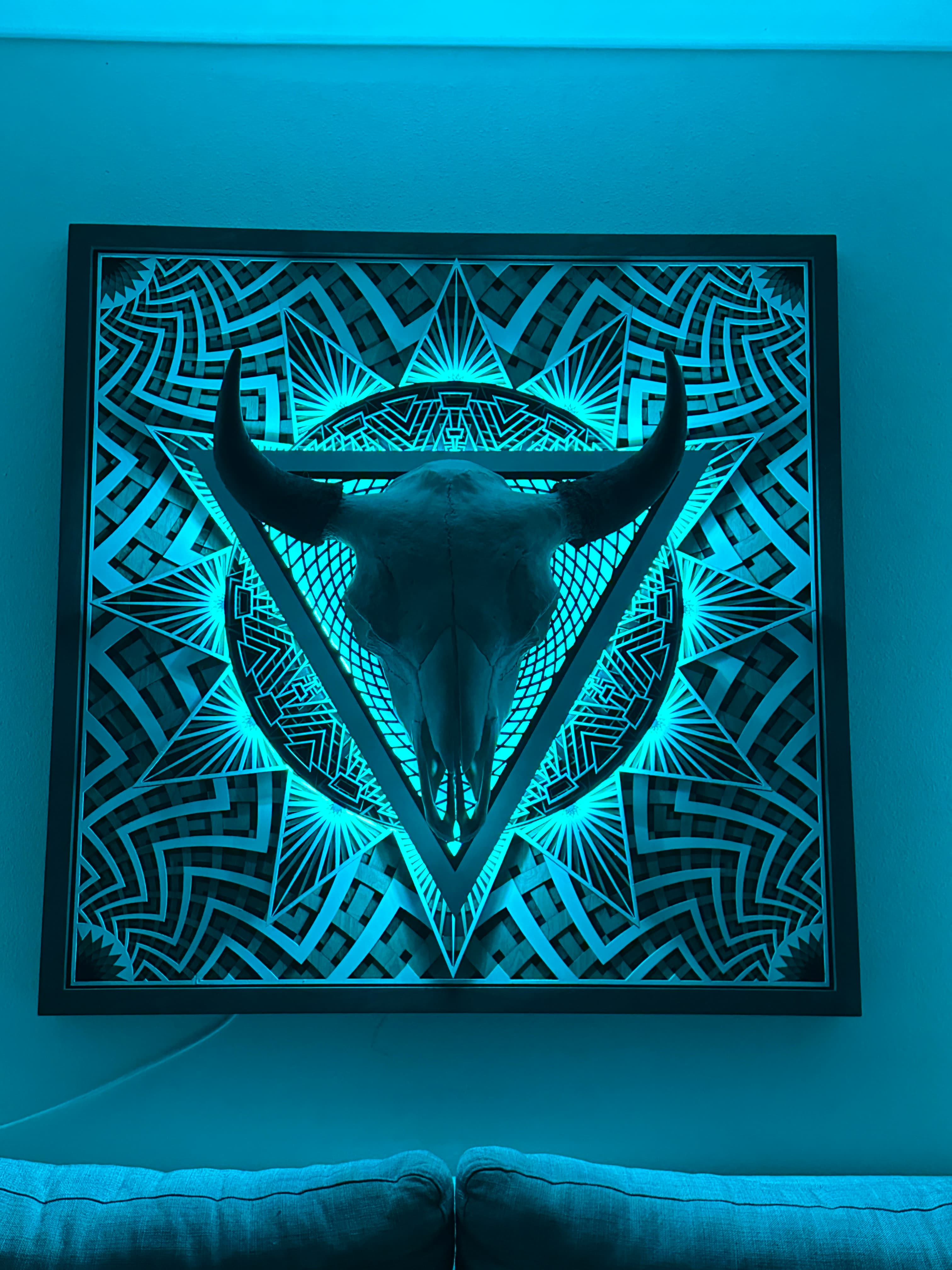 Bison — large format LED light sculpture with teal illumination