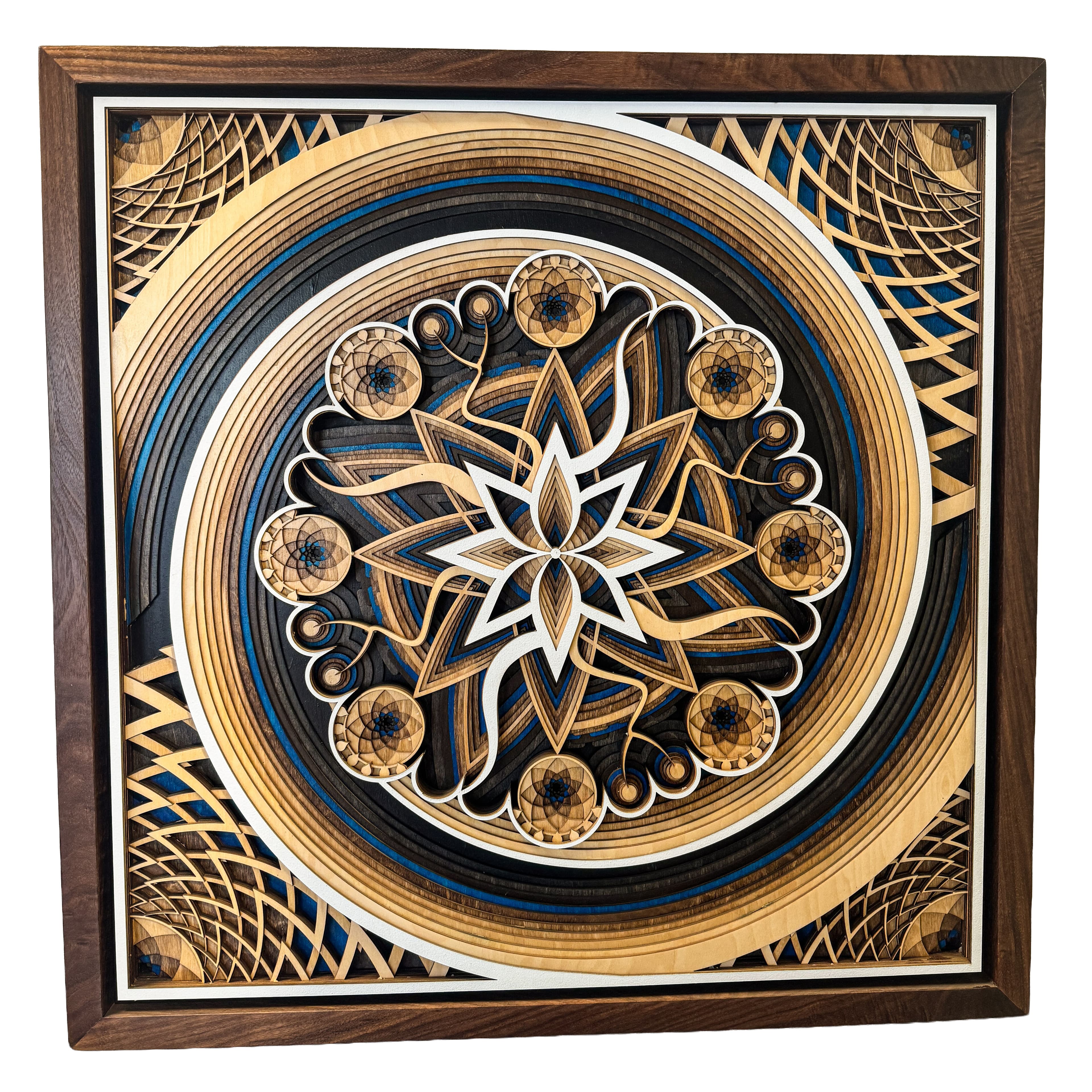 Hilzuni — intricate lasercut mandala with gold and blue tones